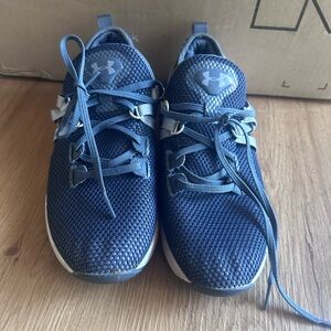 Blue women’s under Armour running shoes